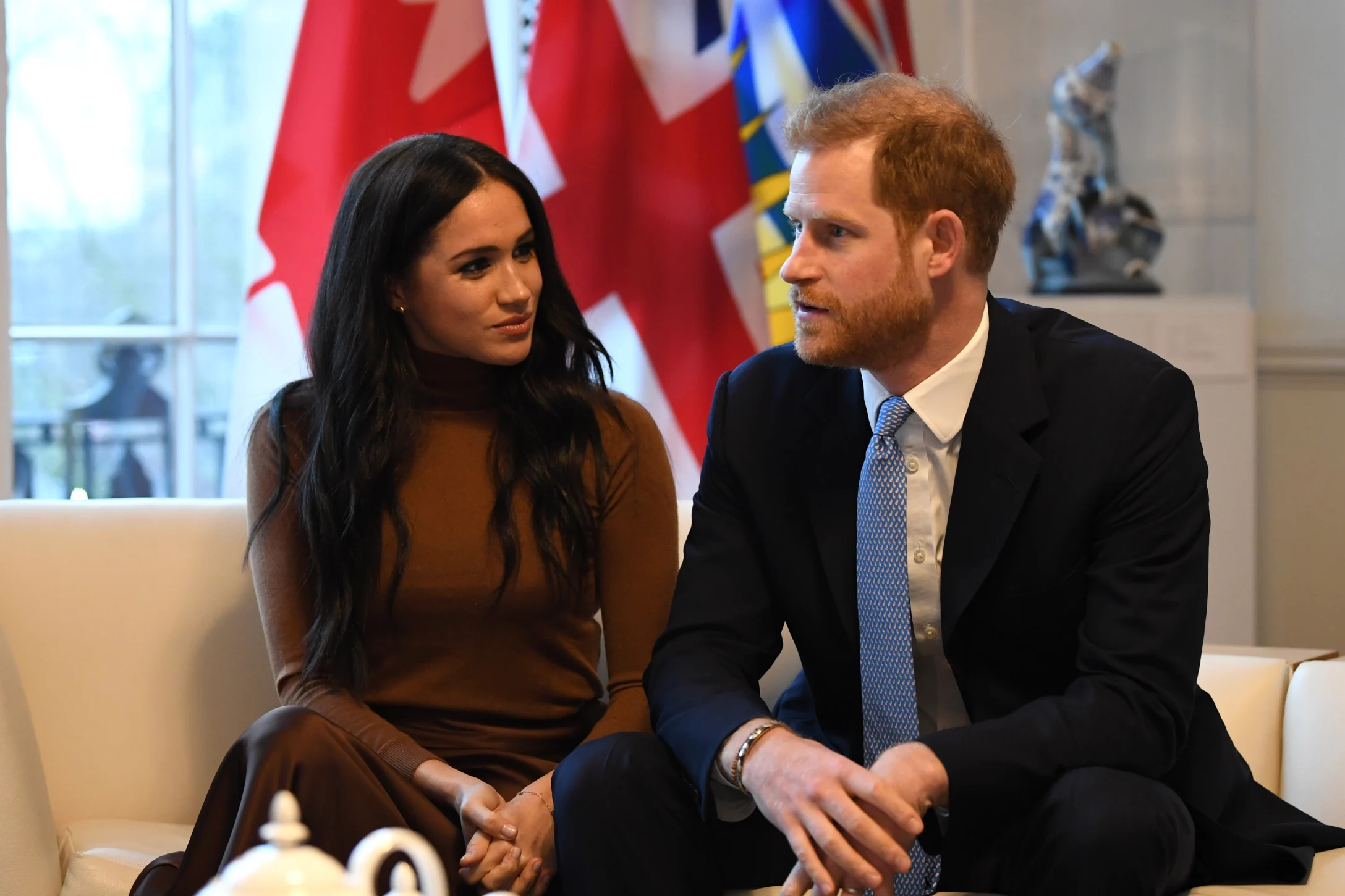 Meghan Markle looking at Prince Harry