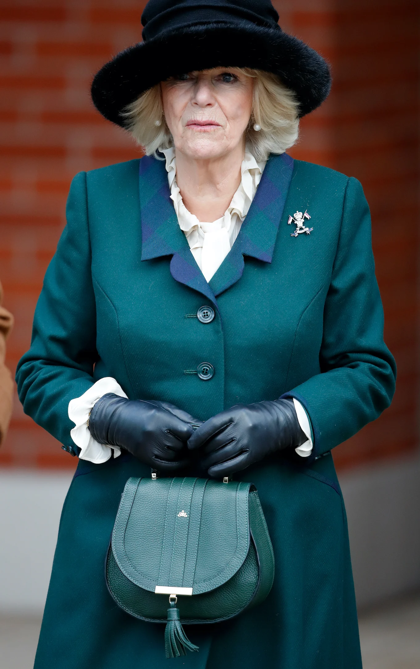 Duchess Camilla green purse