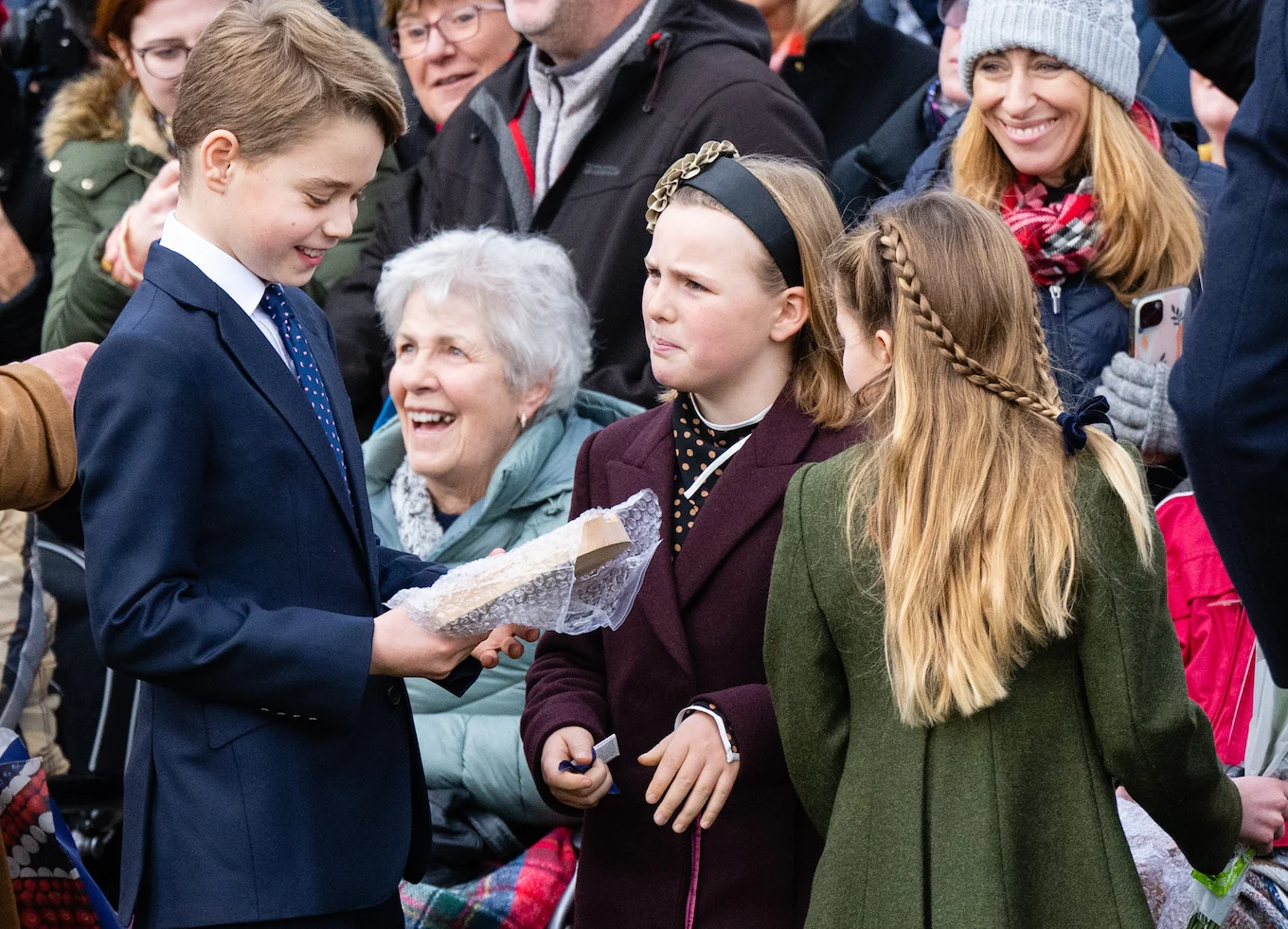 Prince George greeting people on Christmas