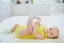 baby girl playing with socks-placeholder