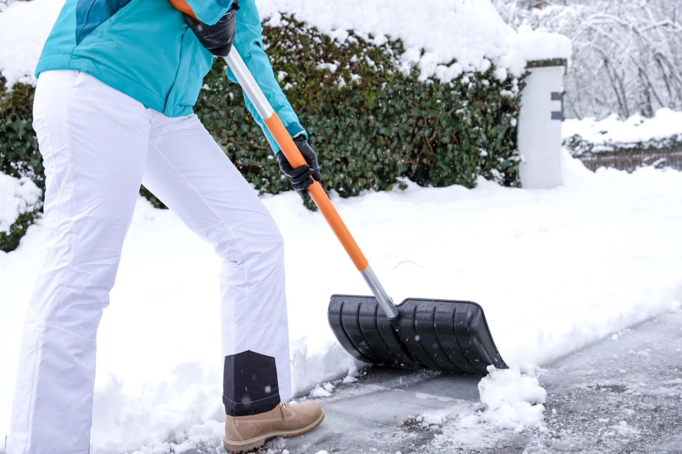 Woman shoveling