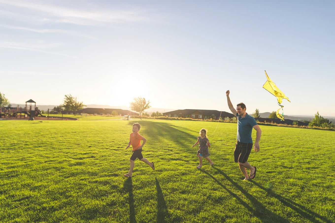 family flying kites