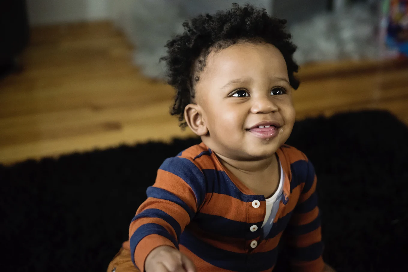 baby boy in striped shirt