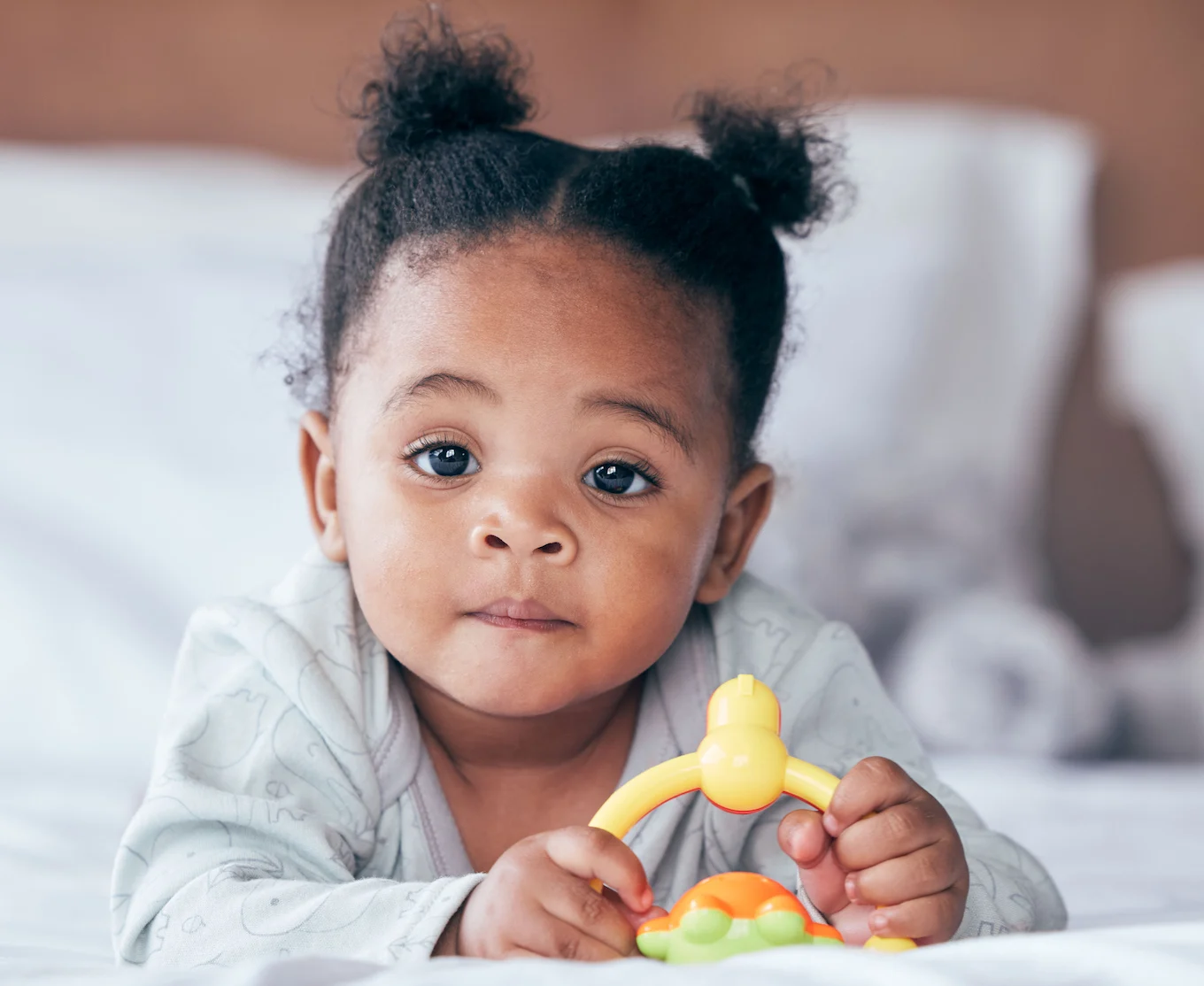 baby girl with toy