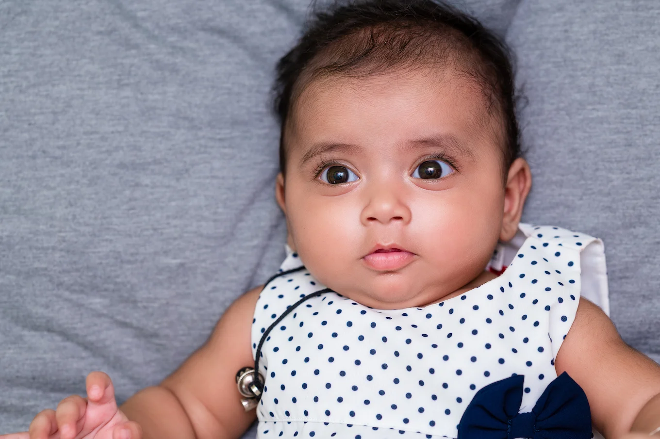 baby girl in polka dots