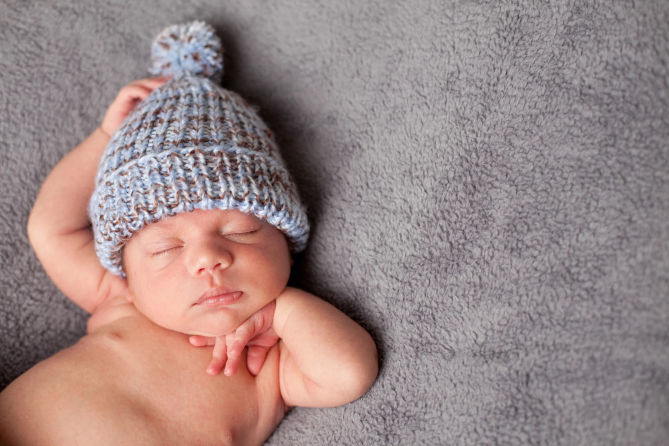 baby boy sleeping in hat