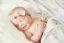 smiling sleeping baby girl-placeholder