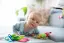 baby boy playing with toys-placeholder