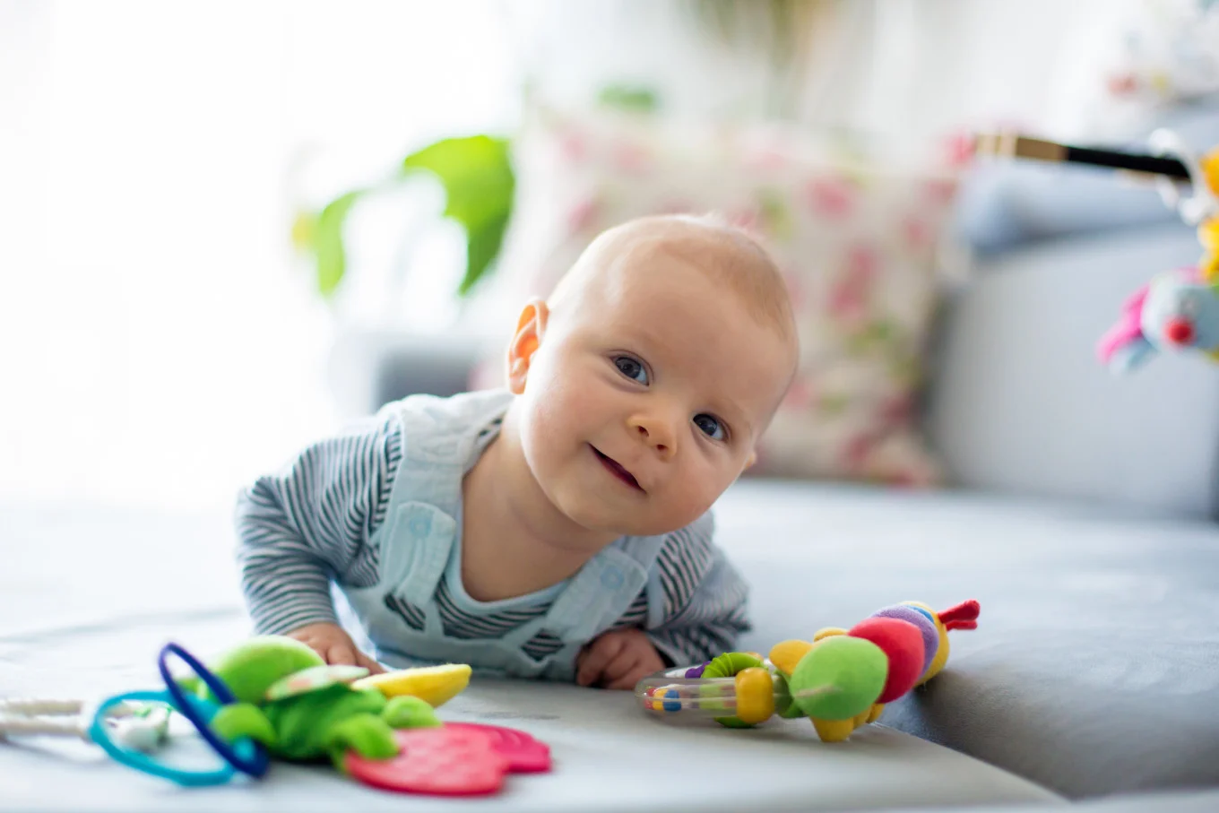 baby boy playing with toys