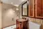 Penthouse bathroom with wood accents-placeholder